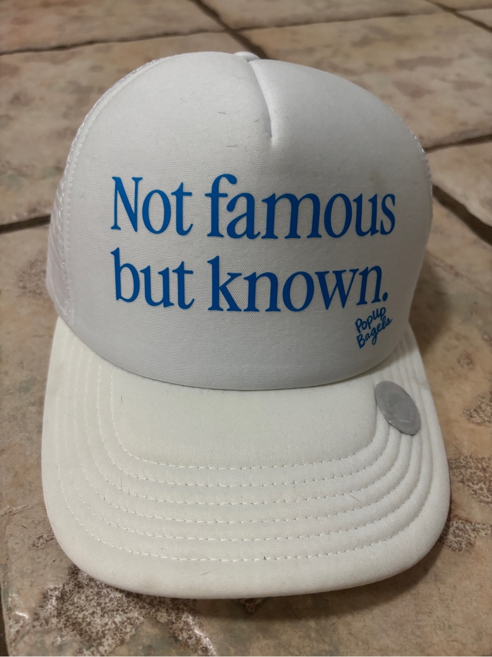 White Trucker Hat with Blue Not famous but known SnapBack adjustable baseball